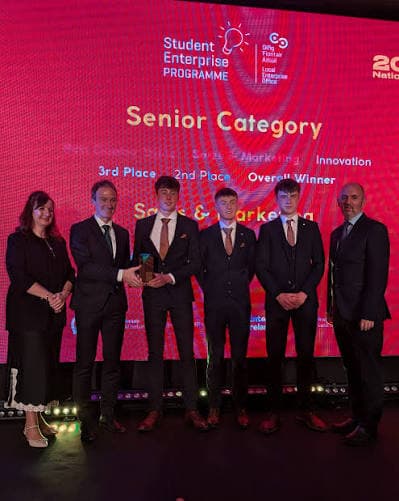 A group on stage at the Student Enterprise Programme awards